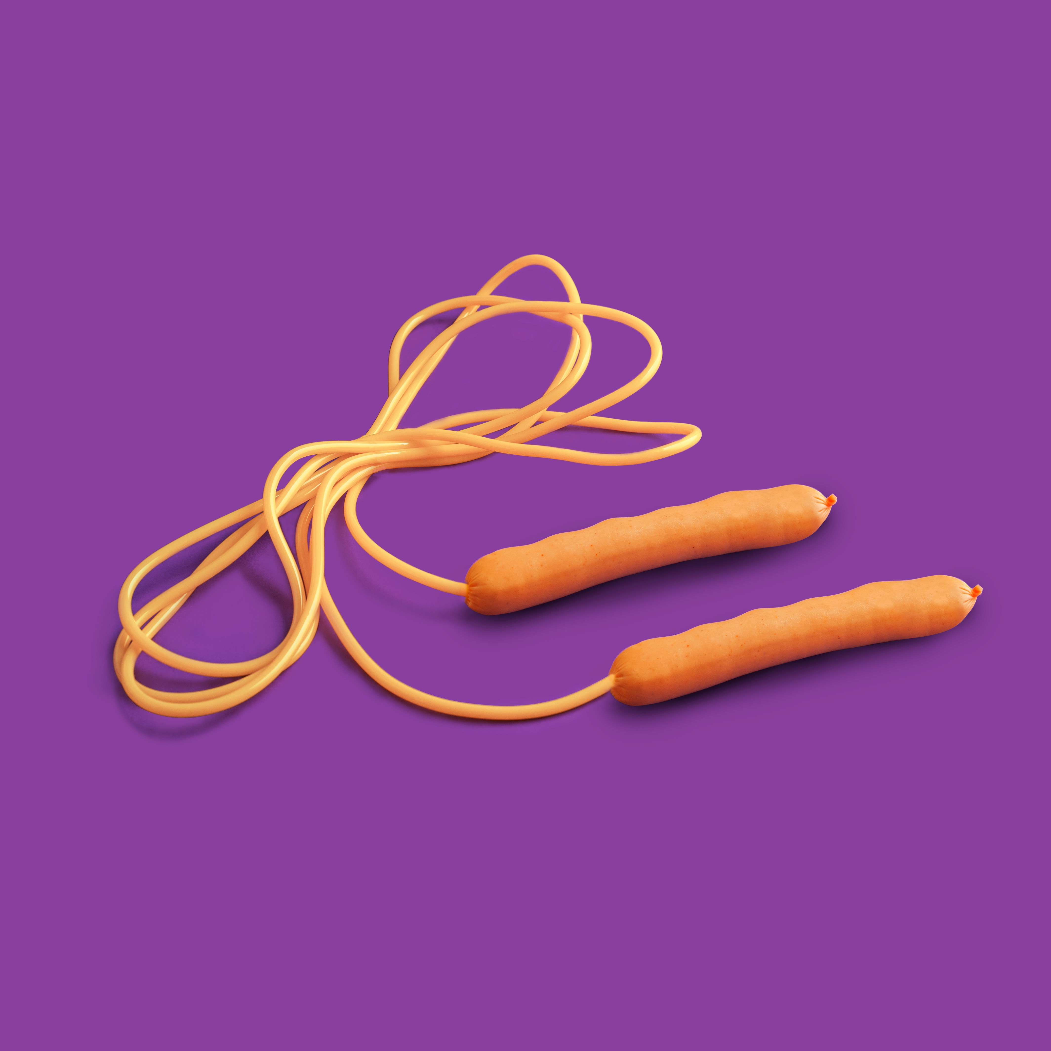 Weighted jump rope with knurled handles